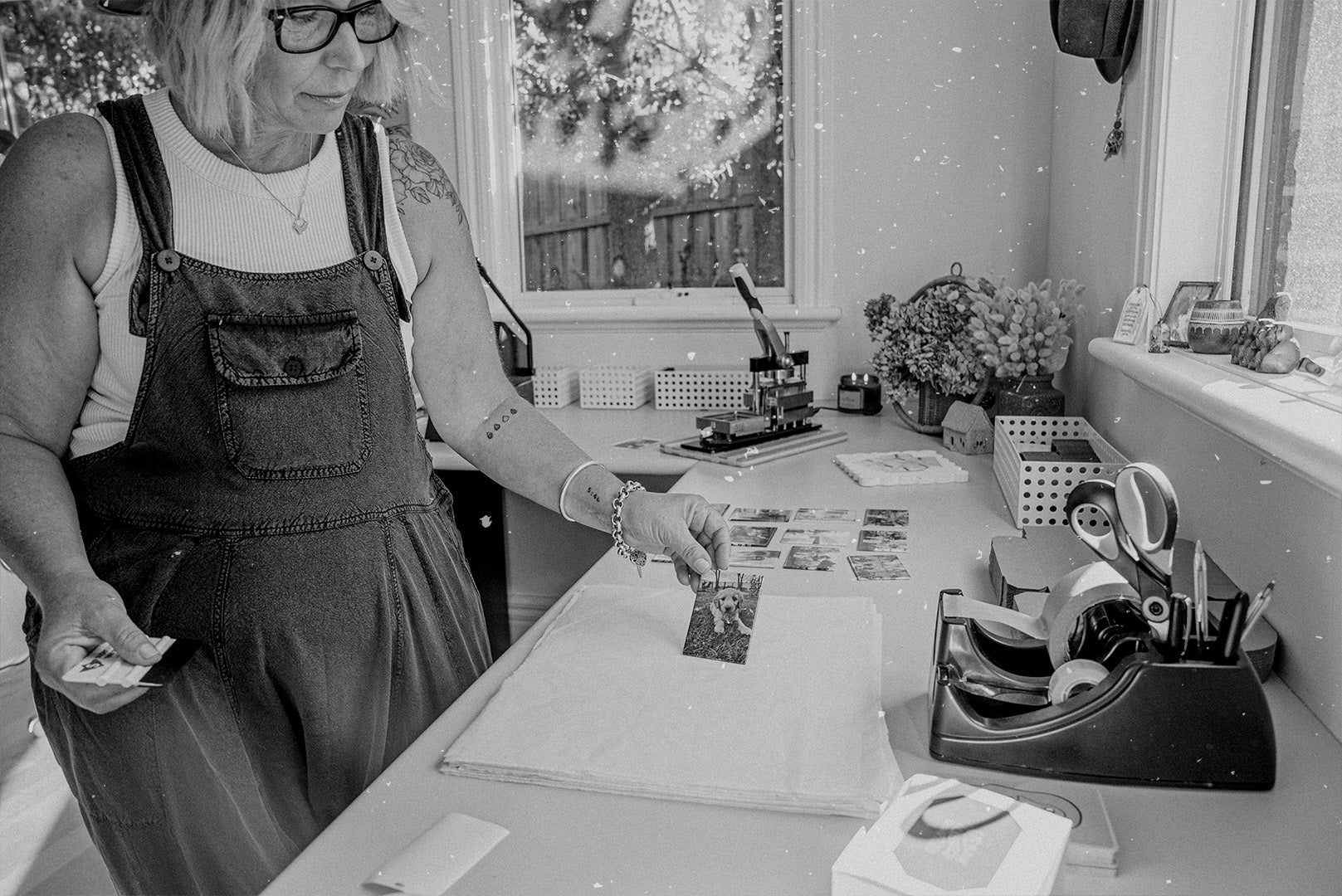 Founder of Urban Magnet Co, Mel, at work showing a customised magnet being made with image of a dog.